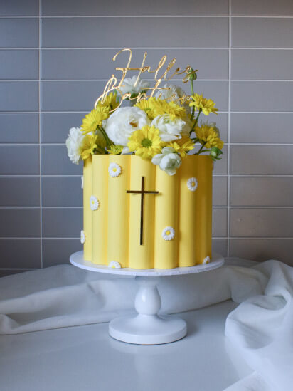 Christening Scallop Cake with fresh flower